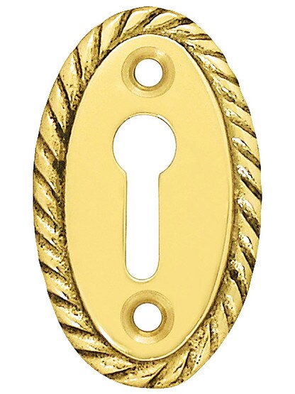 Rope Pattern Brass Keyhole Cover - 1 7/8 x 1 1/8 inch in Un-Lacquered Brass.